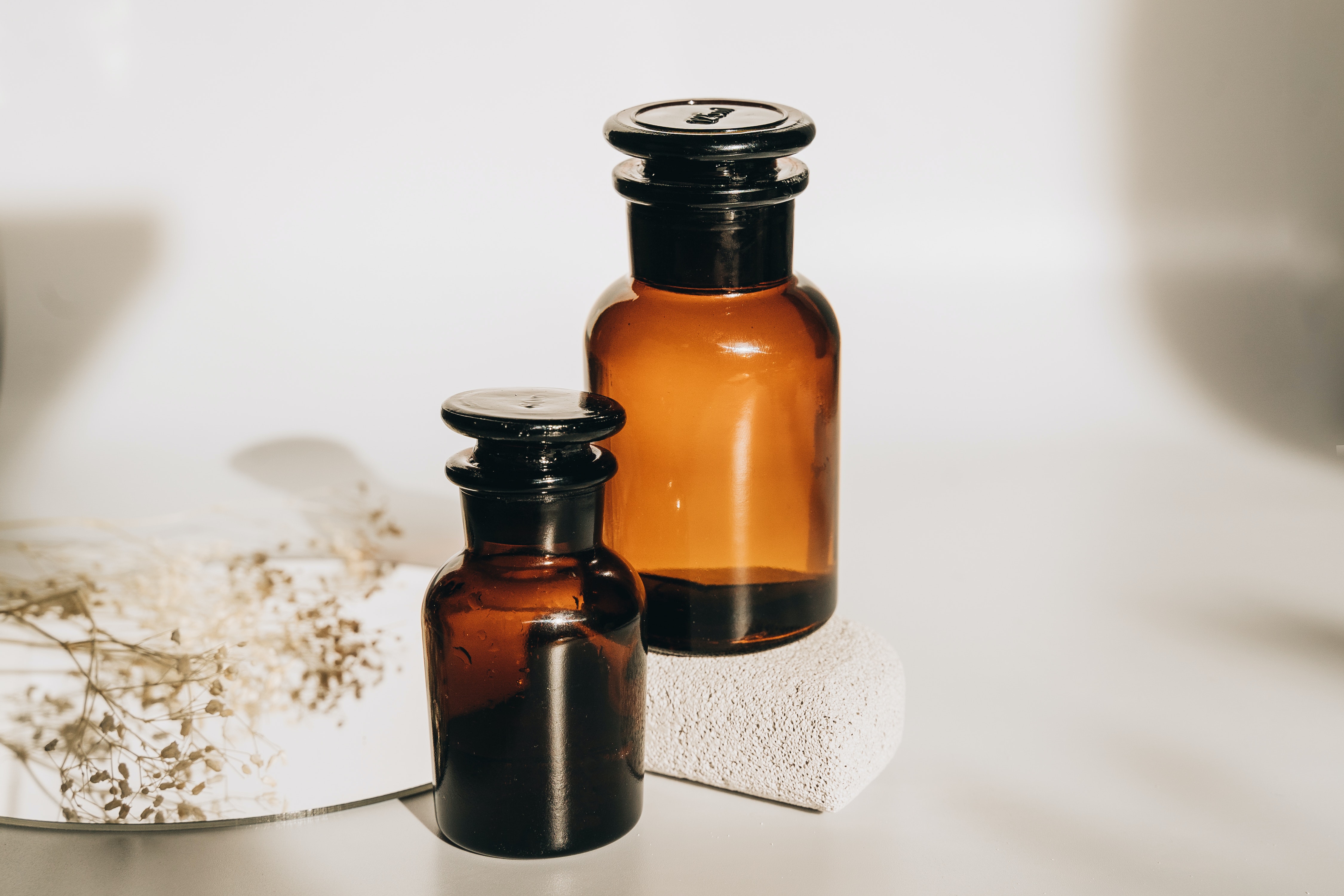 Two amber glass bottles